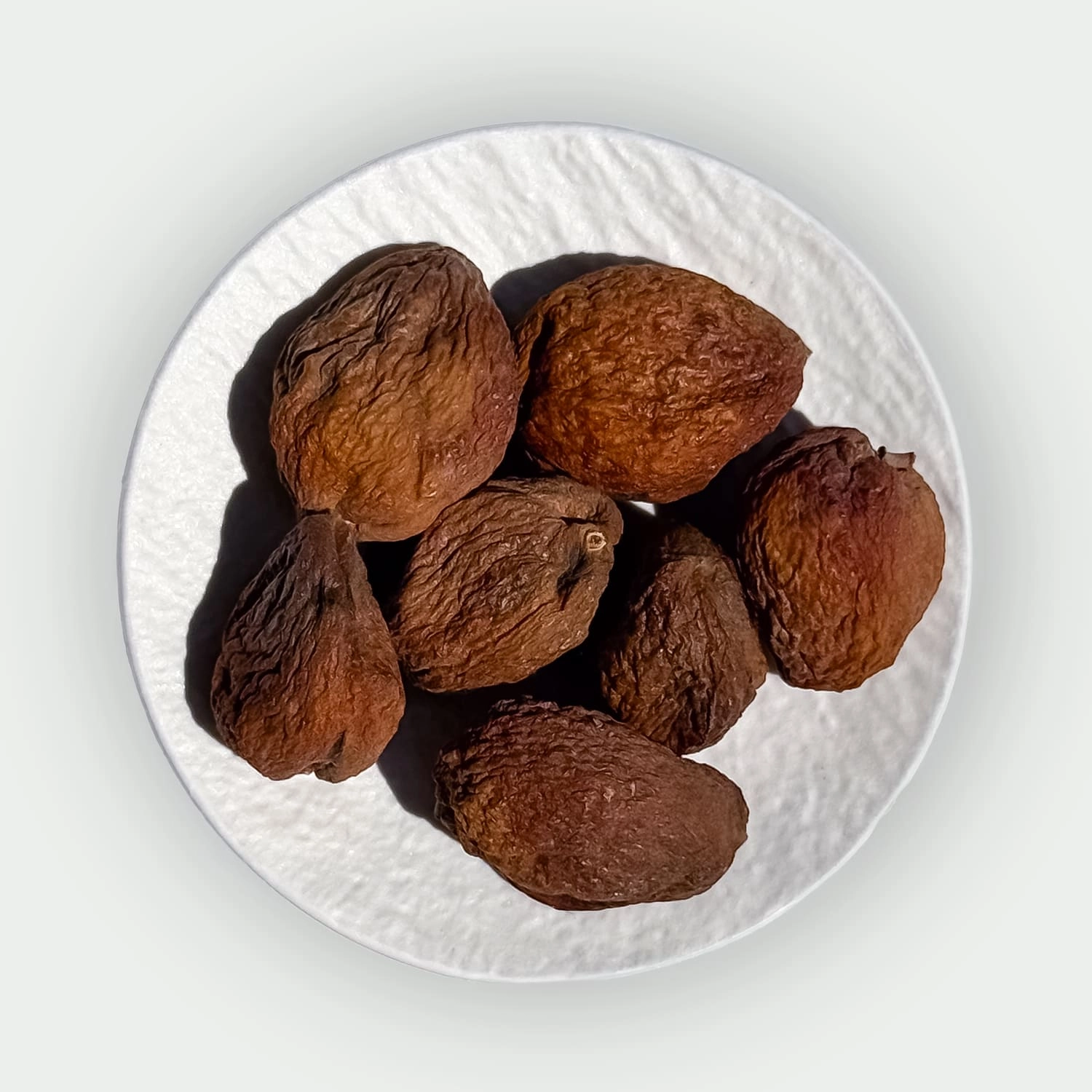 Whole dried apricots with stones