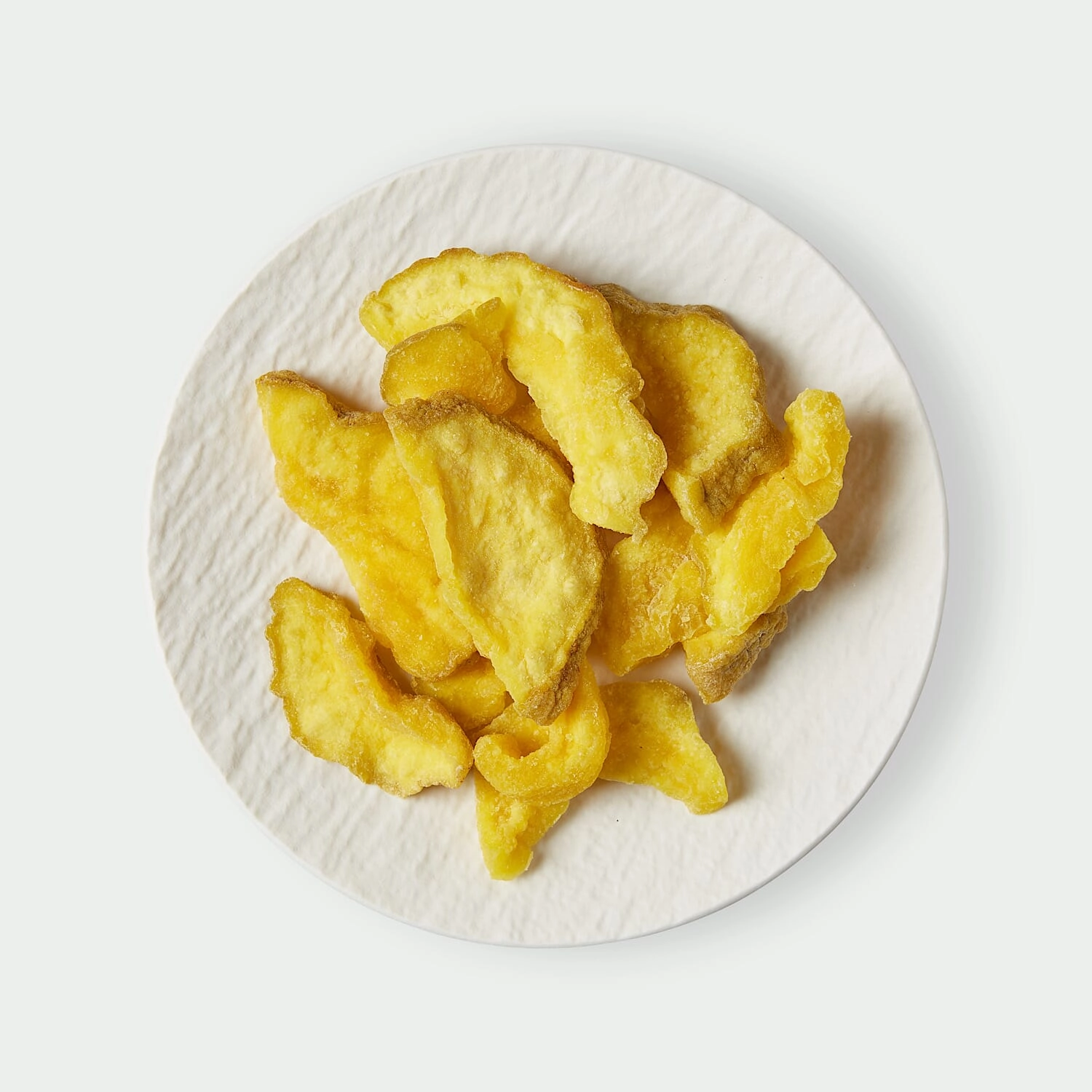 Dried guava pieces on a plate
