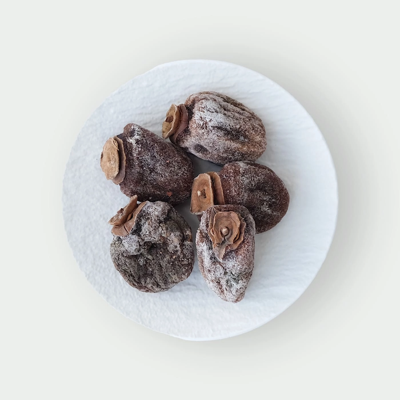 Dried persimmon on a plate