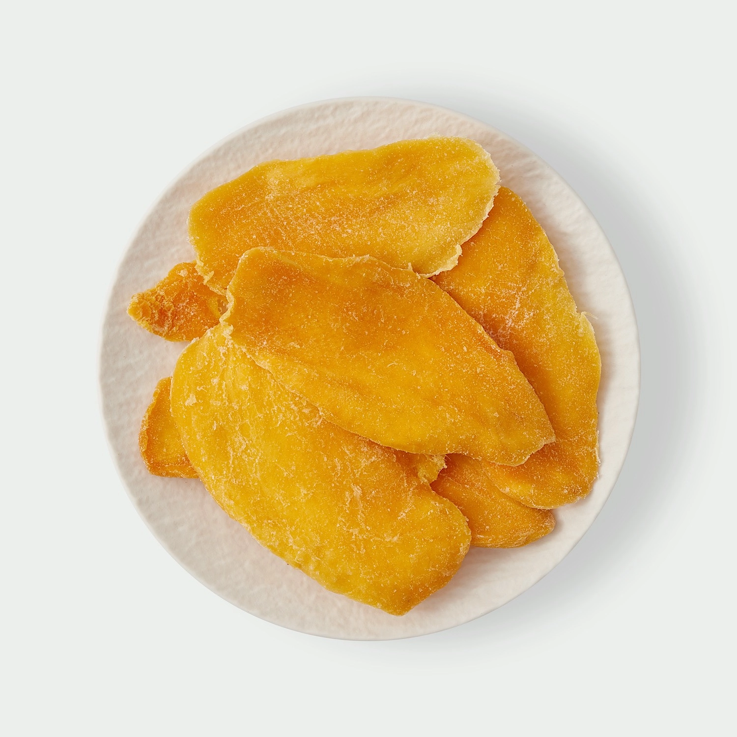 Golden dried mango slices