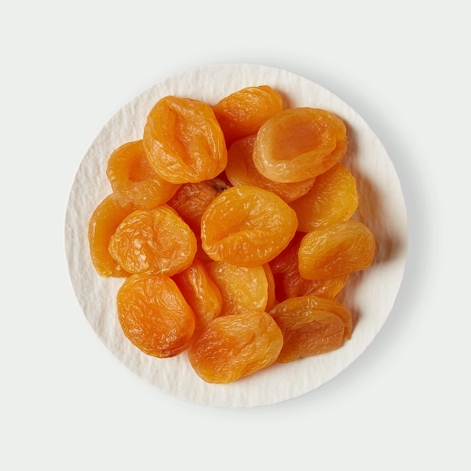 Soft dried apricots on a plate