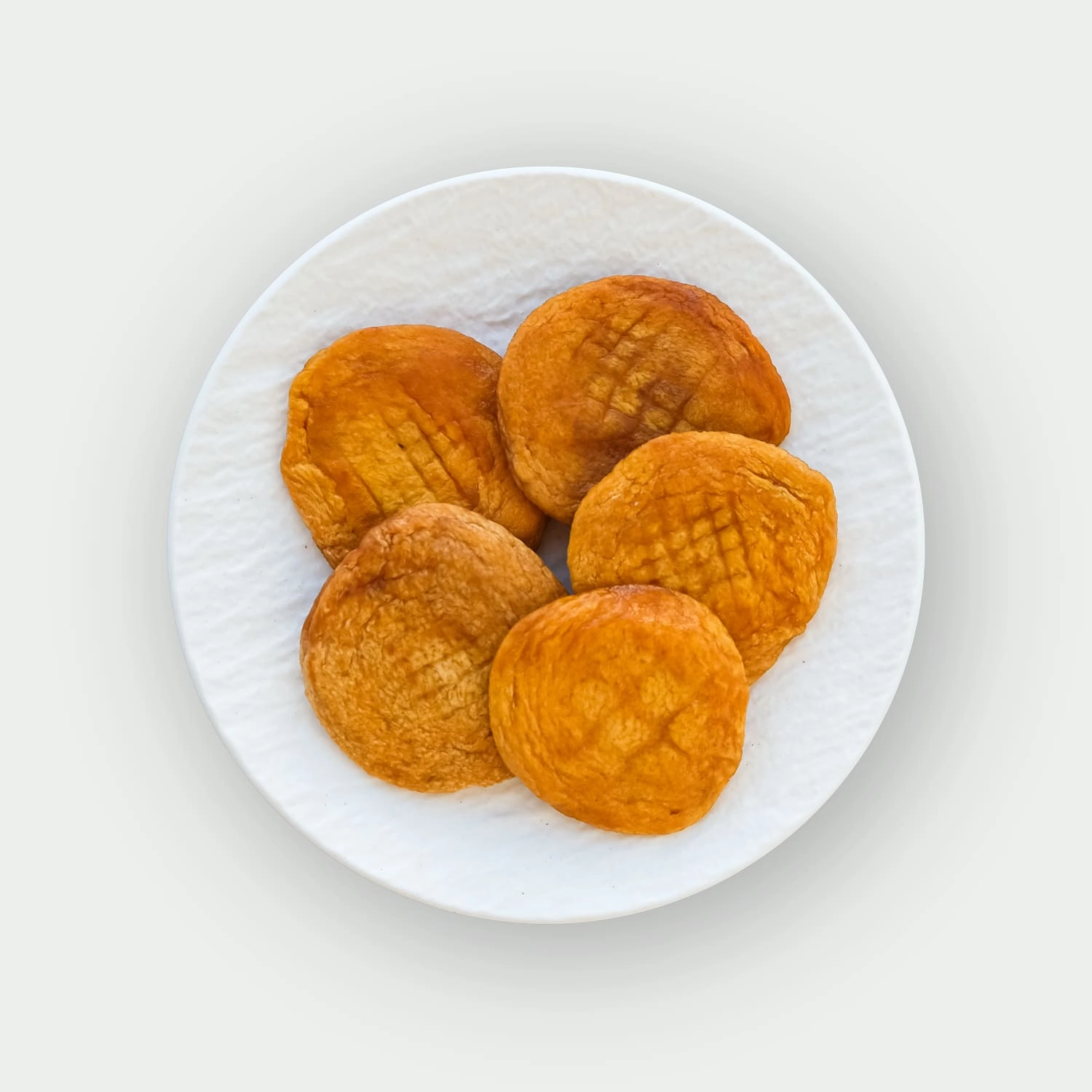 Dried peaches on a plate