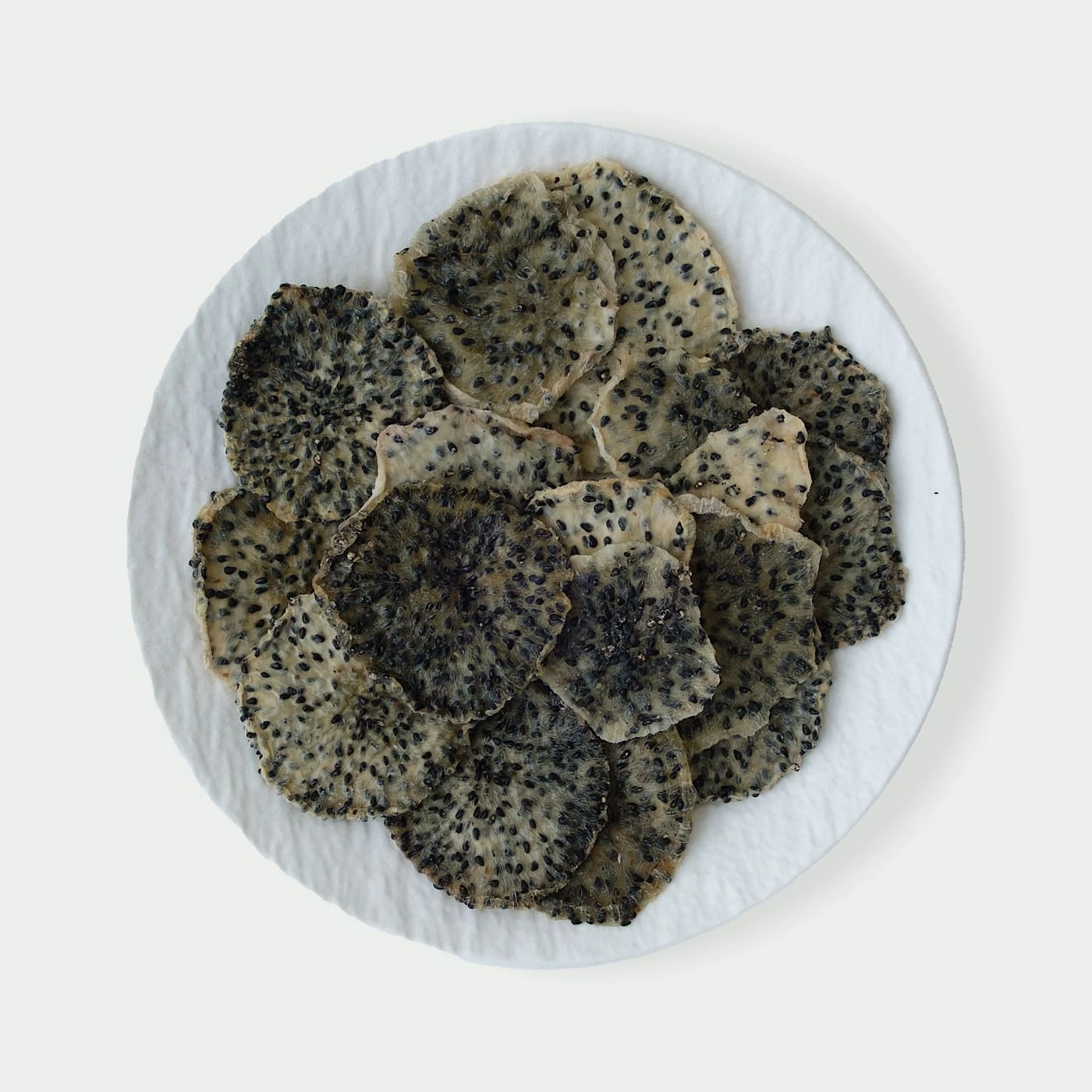 Dried dragon fruit slices with seeds